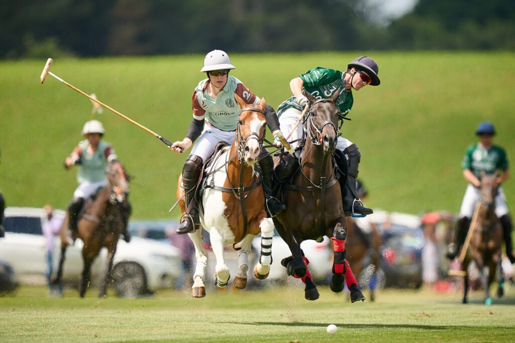 Polo action with ponies hooves off the ground