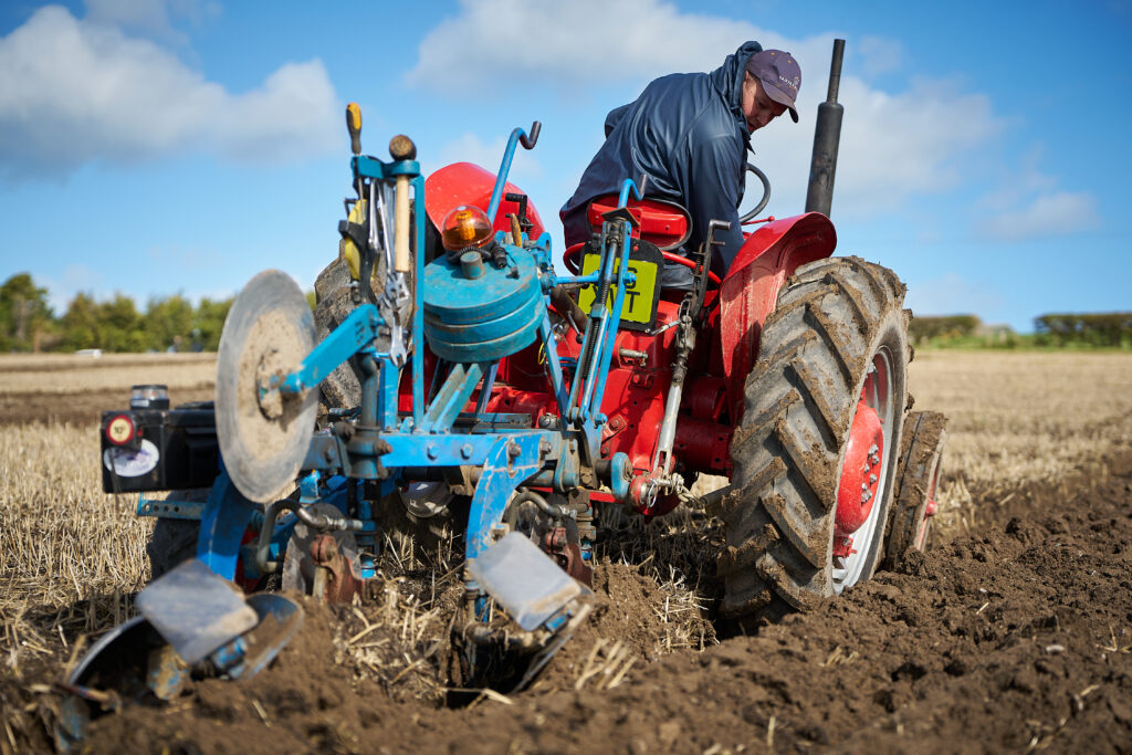 Vintage tractor ploughing